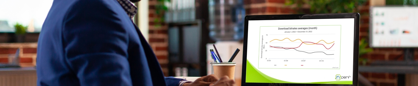 man looking at a nperf test screen